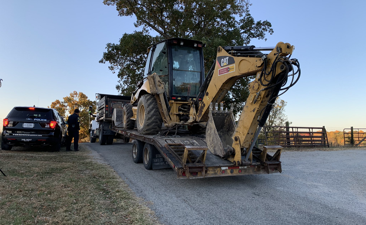 Backhoe arrives at Houck farm in Bardstown